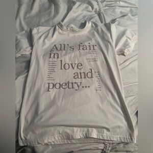 White Graphic T-Shirt with Text Design